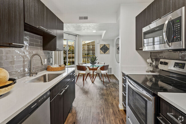 Renovated Kitchen and Dining Area - Woodgate at Jordan Landing