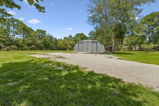 Building Photo - Cottage on 3 Acres with Massive Workshop & Storage