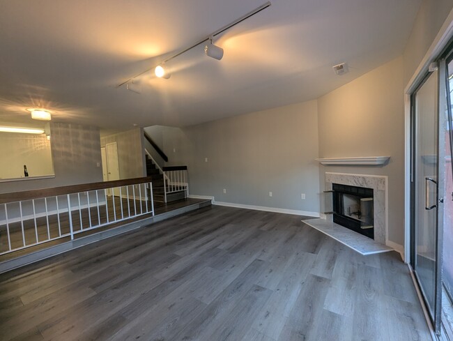 Living room with separate dinning area. - 3145 Hawthorne Dr NE