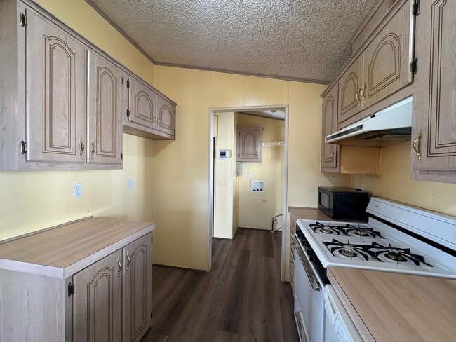 Building Photo - Sunrise Vista -2 Br, 2Ba home with covered carport, fenced yard, storage