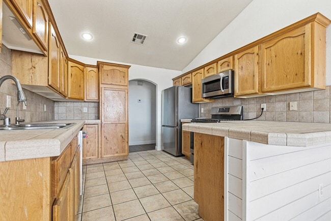 Building Photo - 4 Bedroom 2 Bath with Solar on a Large Corner Lot