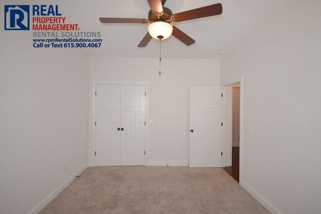 Building Photo - All brick 4 bedroom home plus Bonus room! Garage and covered patio!