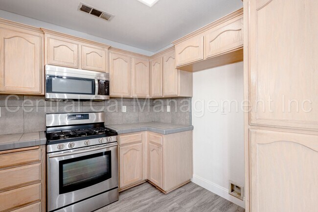 Building Photo - 3 Bedroom/2 Bath with a Pool and Solar - $...