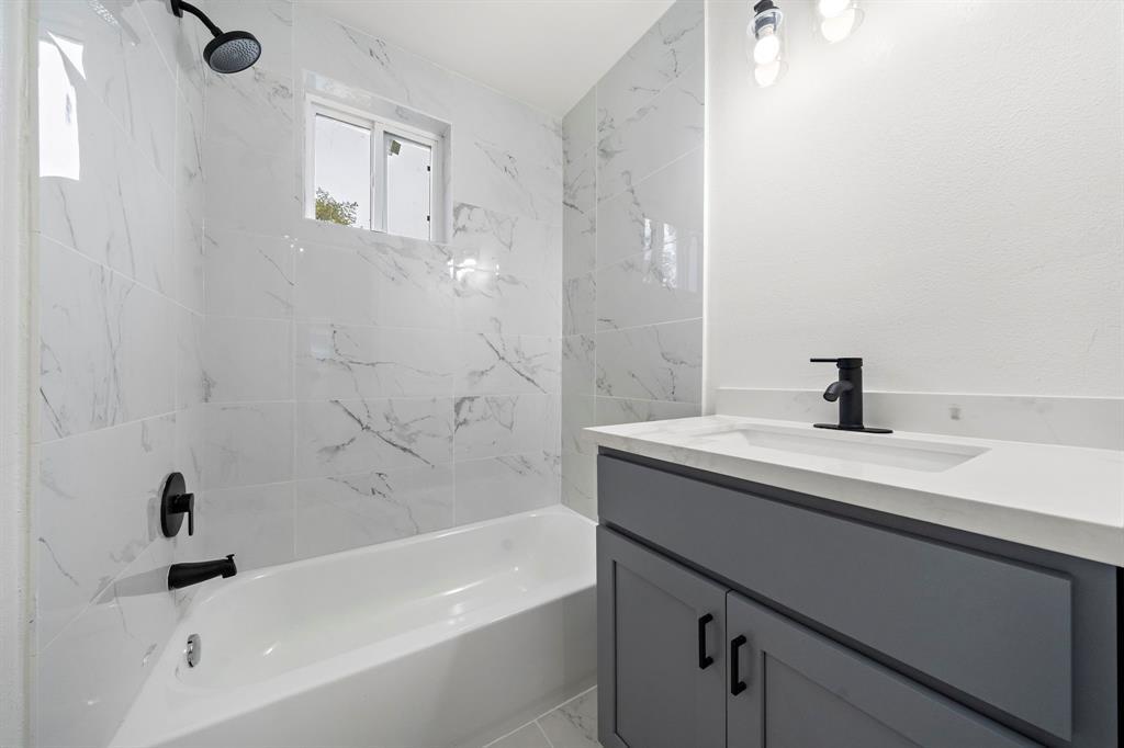 Upgraded bathroom. Mirror has been installed. - 2312 Lucinda St