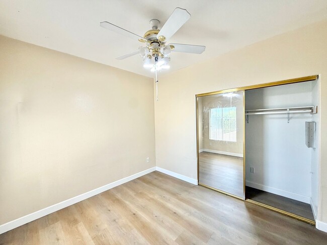 Building Photo - Spacious 5 Bedroom Home with 3 Car Garage & Primary Suite Balcony
