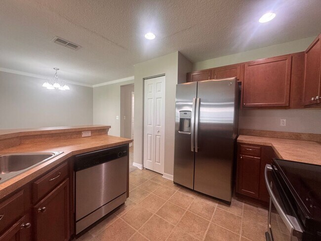 Building Photo - Now Available ! 3BR/2.5BA | Townhome | 1-Car Garage Parking | Community Pool!