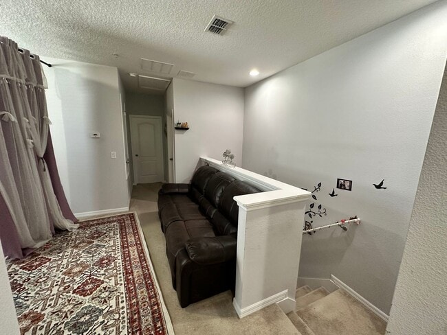 Building Photo - Lease this 3BR End-Unit Townhome in Gated Community with Water View!