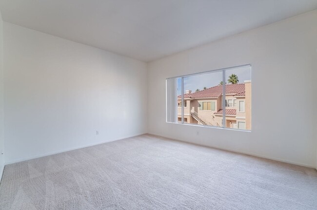 Building Photo - Charming Henderson Condo in Gated Community with Pool Access!