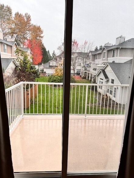 Living room to pack patio. - 6123 S 232nd St