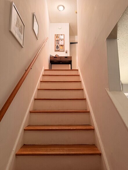 Stairs to Second Level - 211 E Main St