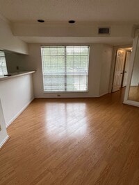 Building Photo - Quiet 1-Bed Condo, New Bedroom Floor, Balc...