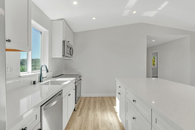 Building Photo - Beautiful new construction - lower level unit