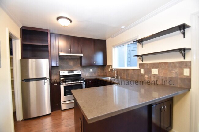 Building Photo - Bright & Peaceful 2BR Townhouse with Deck,...