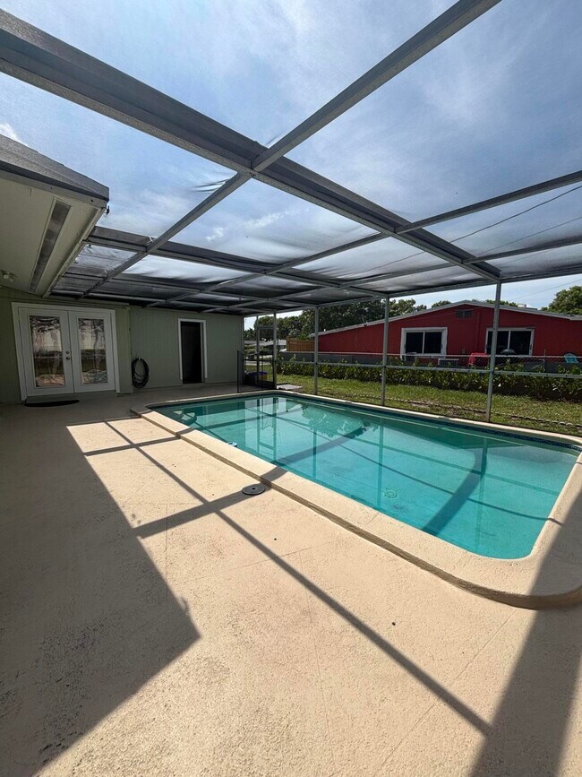 Building Photo - 9109 Bamboo Dr