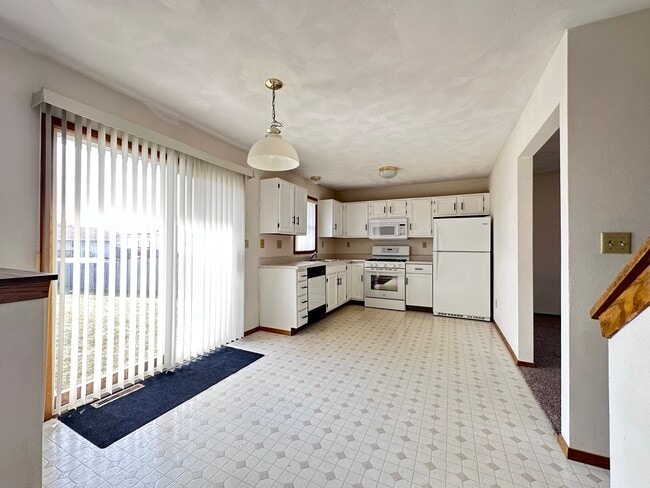 Building Photo - 6497 Maeve Ln