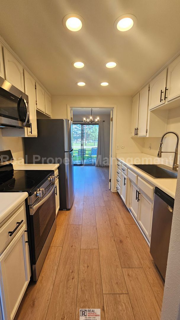 Building Photo - Coming Soon: Updated 2BR Townhome w/ Private Fenced Patio & Garage – Cameron Park