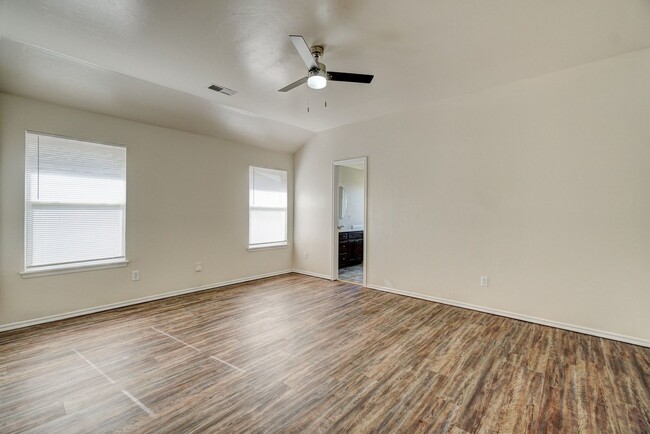 Building Photo - Spacious 4-Bedroom Home with Corner Firepl...