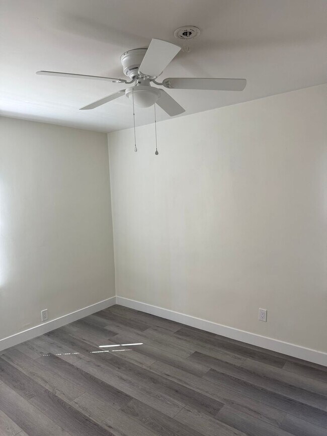 Building Photo - FOR RENT — COMPLETELY REMODELED Apartment