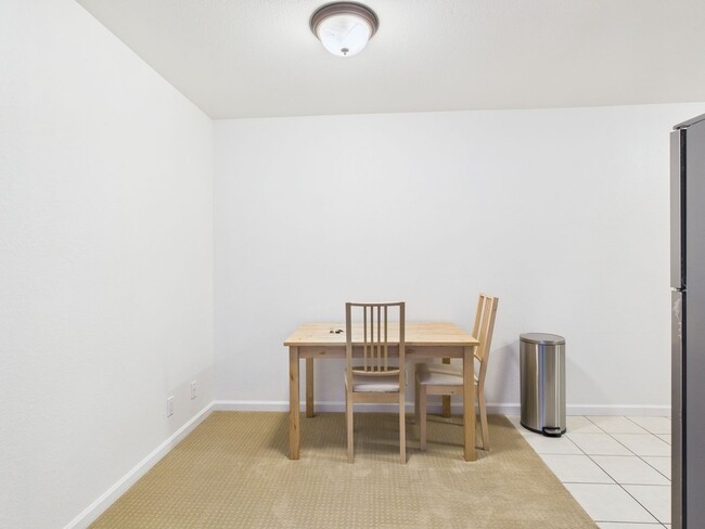 Building Photo - Upstairs 1 bedroom condo now available at Cypress Park