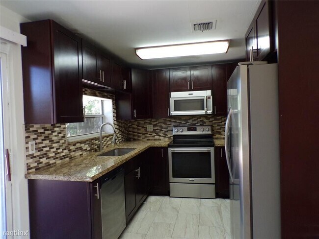 Building Photo - 4 br, 2 bath House - 5641 Freedom St 1