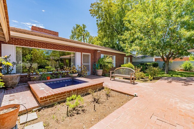 Building Photo - Classic Red Brick Beauty in Prestigious No...