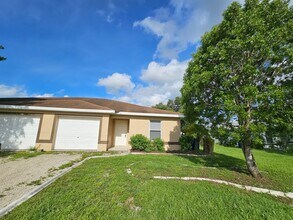 Building Photo - Price Drop! 2/2 plus Den