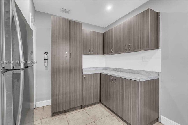 Building Photo - 6940 NW 6th Ct