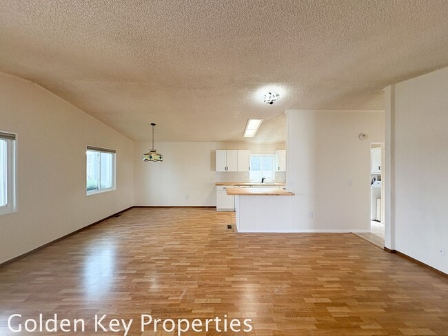 Building Photo - Welcome to the spacious single-level manuf...