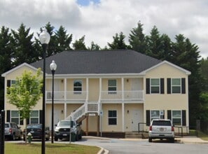 Building Photo - Sign a 12-month lease now and receive the ...