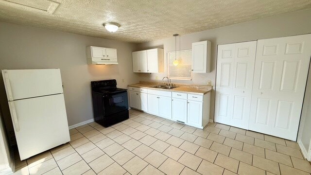 Building Photo - WEST SIDE 3 BEDROOM RANCH HOME AVAILABLE NOW!