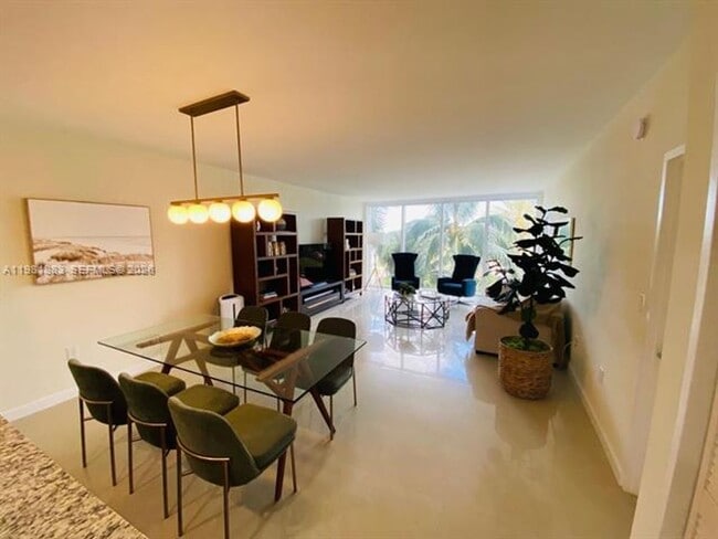 Building Photo - 10275 Collins Ave