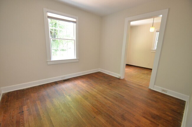 Building Photo - Charming 2-Bedroom, 2-Bath Single-Family Home with Sunroom & Wooded Views