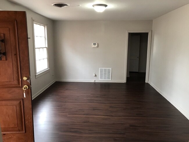 Building Photo - 3 Bedroom/1 bath home on corner lot with a large fenced back yard