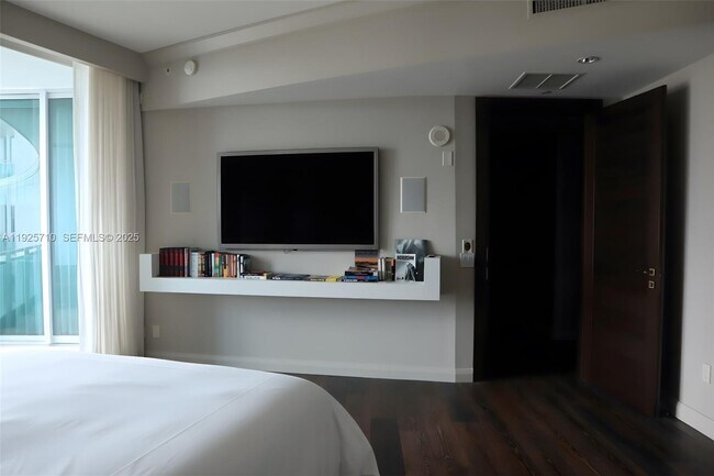 Building Photo - 10295 Collins Ave