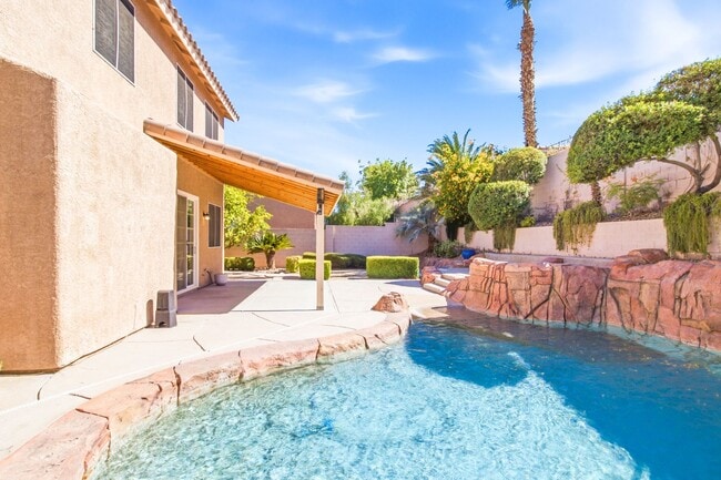 Building Photo - Beautiful 4-Bedroom Home with Pool & Rock Waterfall in 89002