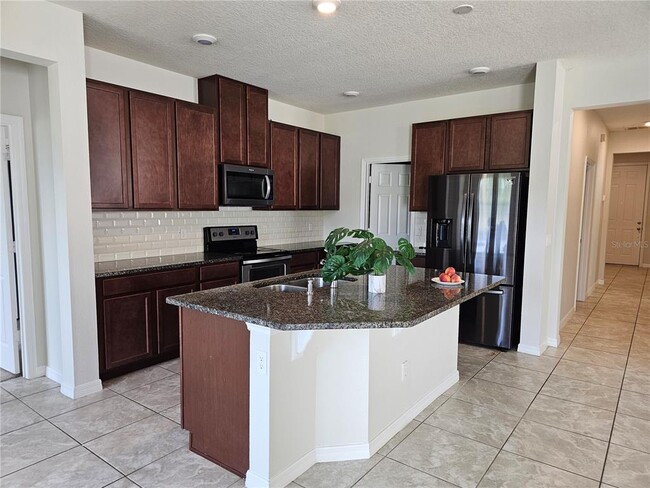 Building Photo - 4078 Pindo Palm Ln