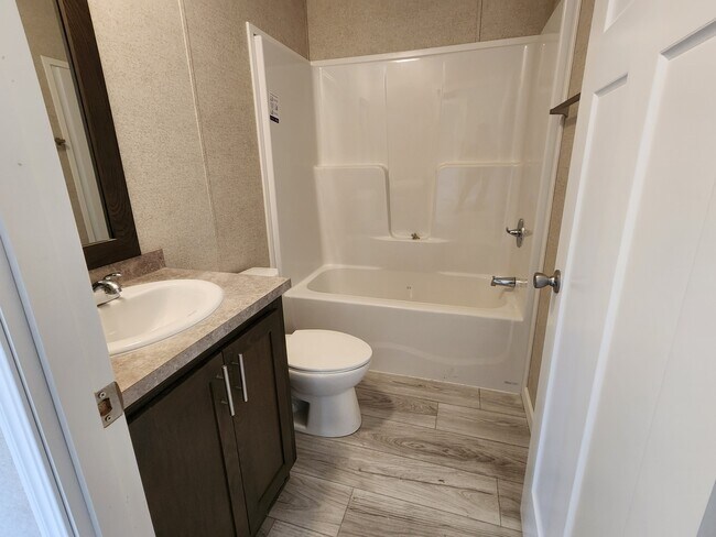 Building Photo - 5695 Windjammer Ct