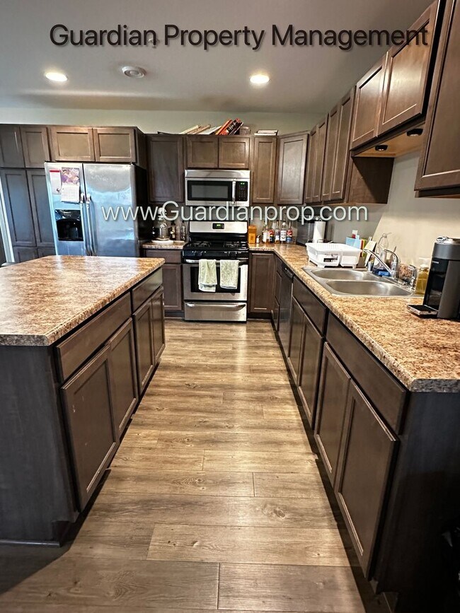 Building Photo - Lakeville Corner Unit, Walk out Patio, 2 Car Garage, W/D on Upper Level, 2.5 Baths