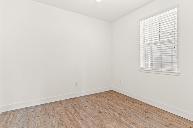 Building Photo - Sun-Filled Corner 4BR w/ Dual Yards & Panoramic Indoor-Outdoor Flow