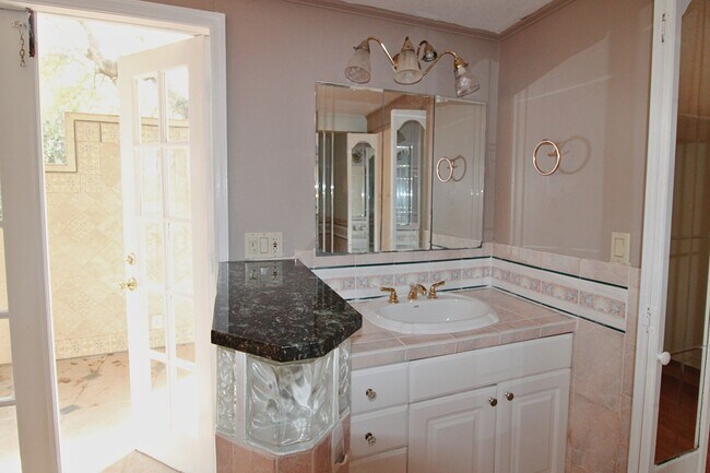 Building Photo - Stunning 3-Bed, 2-Bath Spanish-Inspired Custom Home with Elegant Gardens & Fountains