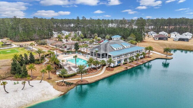 Building Photo - "Charming 2-Bedroom Retreat with 2 Baths and Den - 1558 Sq. Ft. of Comfort in Latitude Margaritav...