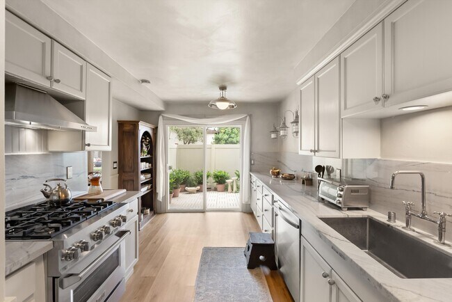 Kitchen looking out to Patio - 22855 S Van Deene Ave