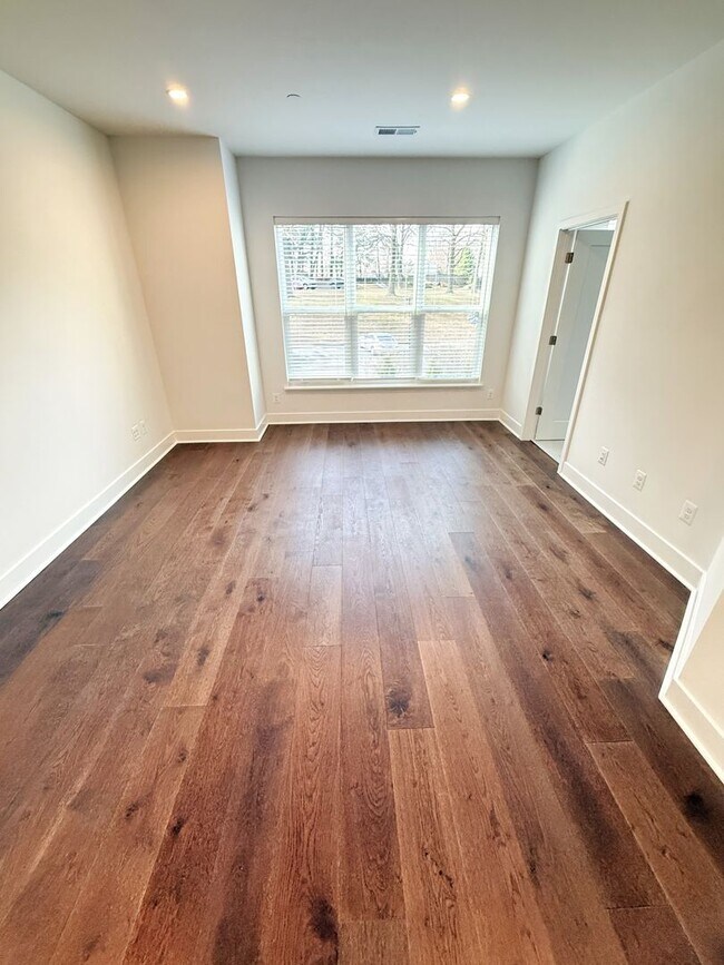 Building Photo - Brand new 4 level, 4 Bedroom Townhome with Elevator!