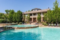 Building Photo - Move-In Ready! Pet-Friendly Woodlands Condo with Community Amenities