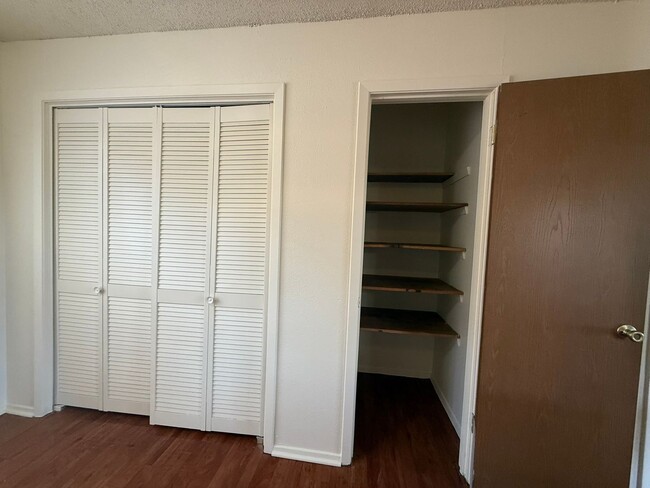 Building Photo - Wood Properties1 (8102 Dunn St)