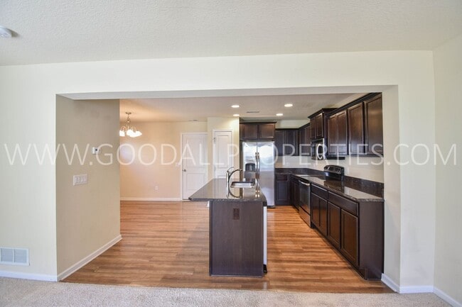 Building Photo - 2-Primary Suite Bedrooms, 2.5-Bath End-Unit Townhome in West Des Moines with Attached 2-Car Garage