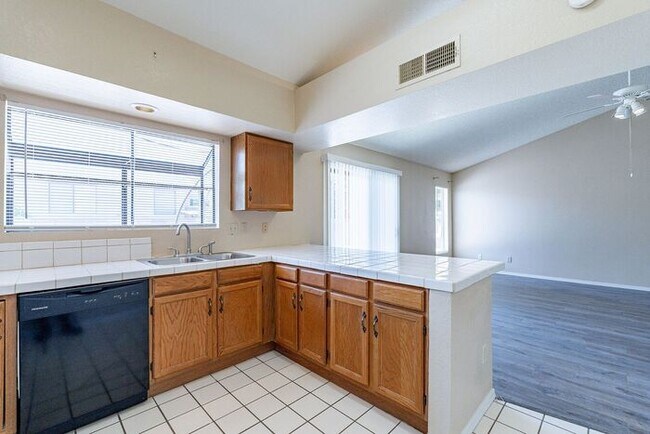 Building Photo - Bright, Spacious & Ready to Welcome You Ho...