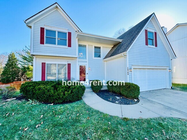 Building Photo - Blue Valley Northwest home on a cul-de-sac w/ granite counters, ss appliances and fenced yard!