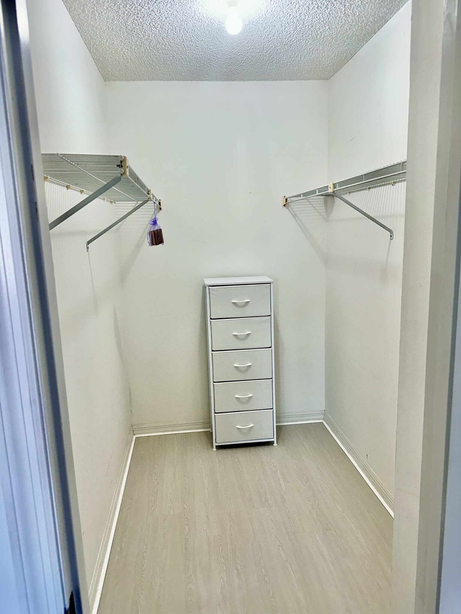 Master bedroom walk in closet - 174 Maritime Pl