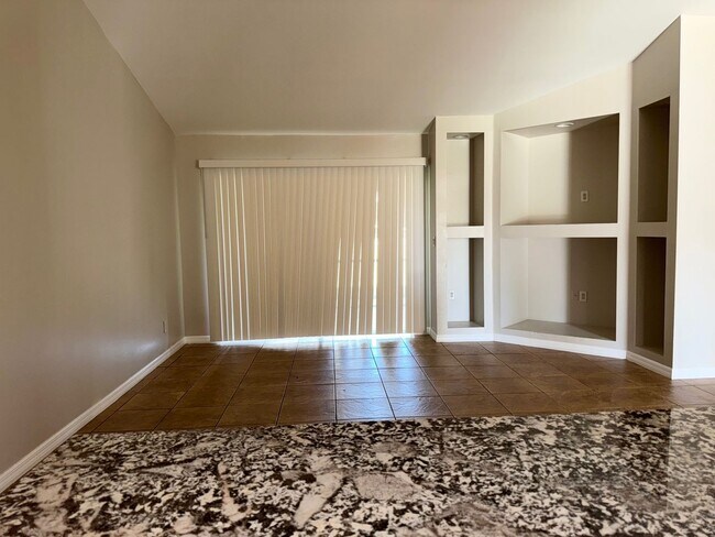 Building Photo - Experience this Cape Coral 3 bedroom 2 bath corner duplex with 1 car garage and screened in lanai.